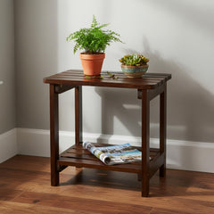 Shine Company table beside Adirondack chair for scale, shows compact footprint benefit