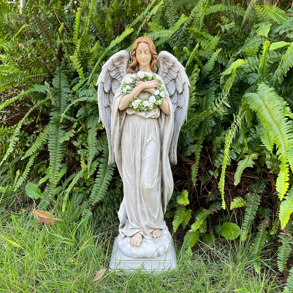 ShineOnAngel in garden setting displayed among flowers for peaceful accent