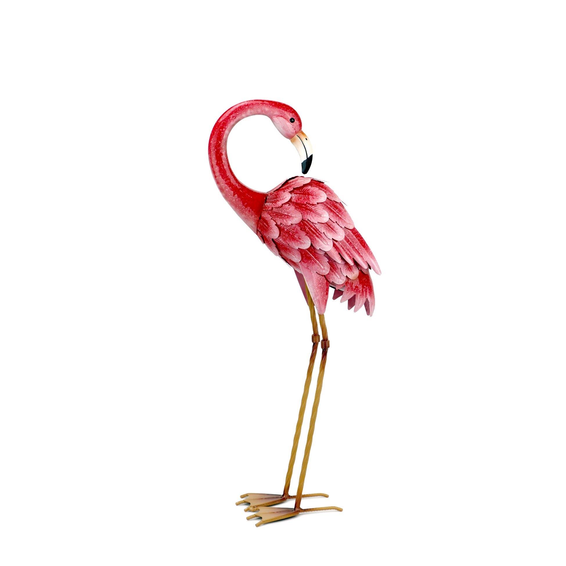 Shorayn flamingo placed in flower bed showing integrated garden styling and benefit: playful curb appeal