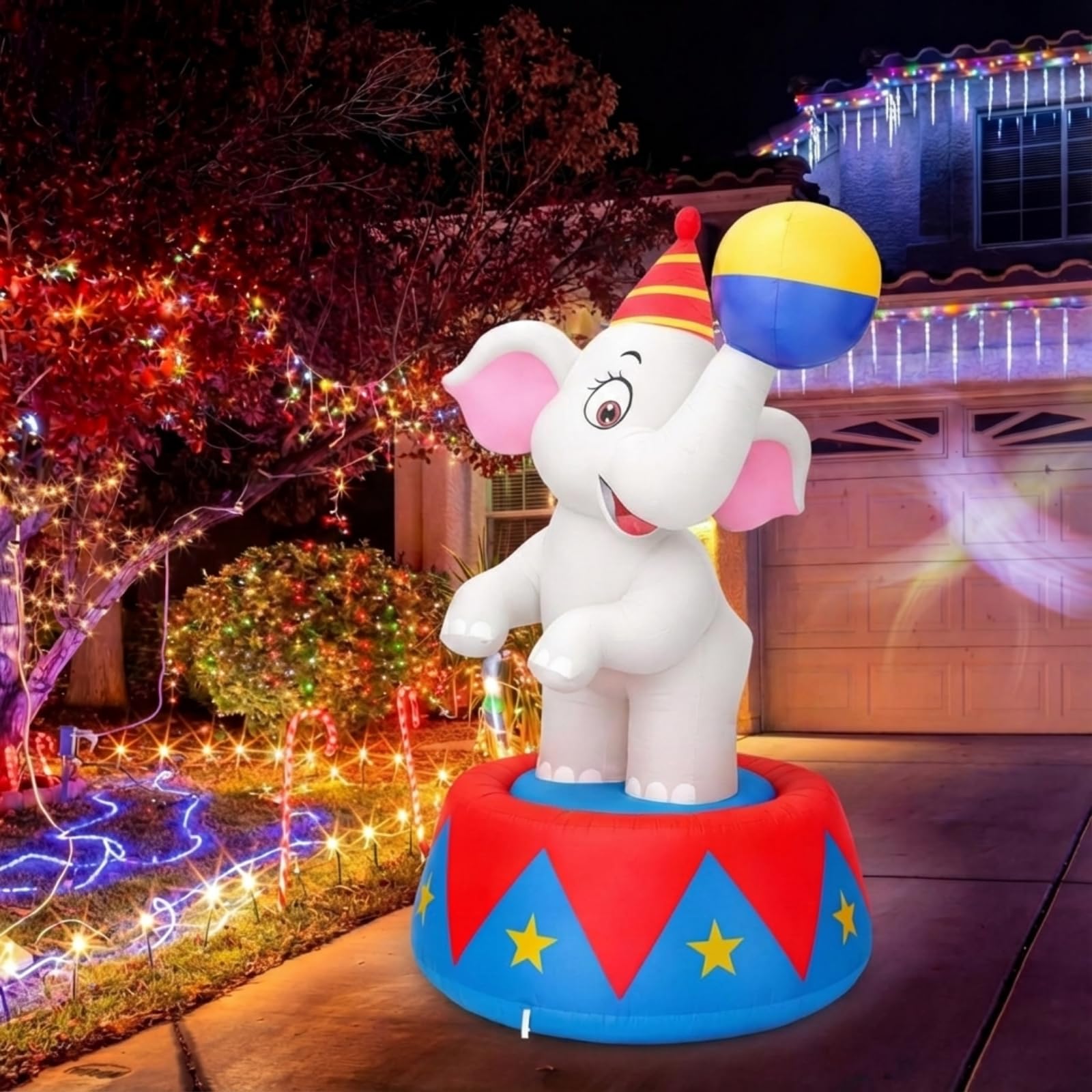 Silipull inflatable elephant beside pool adding carnival charm and bright lighting