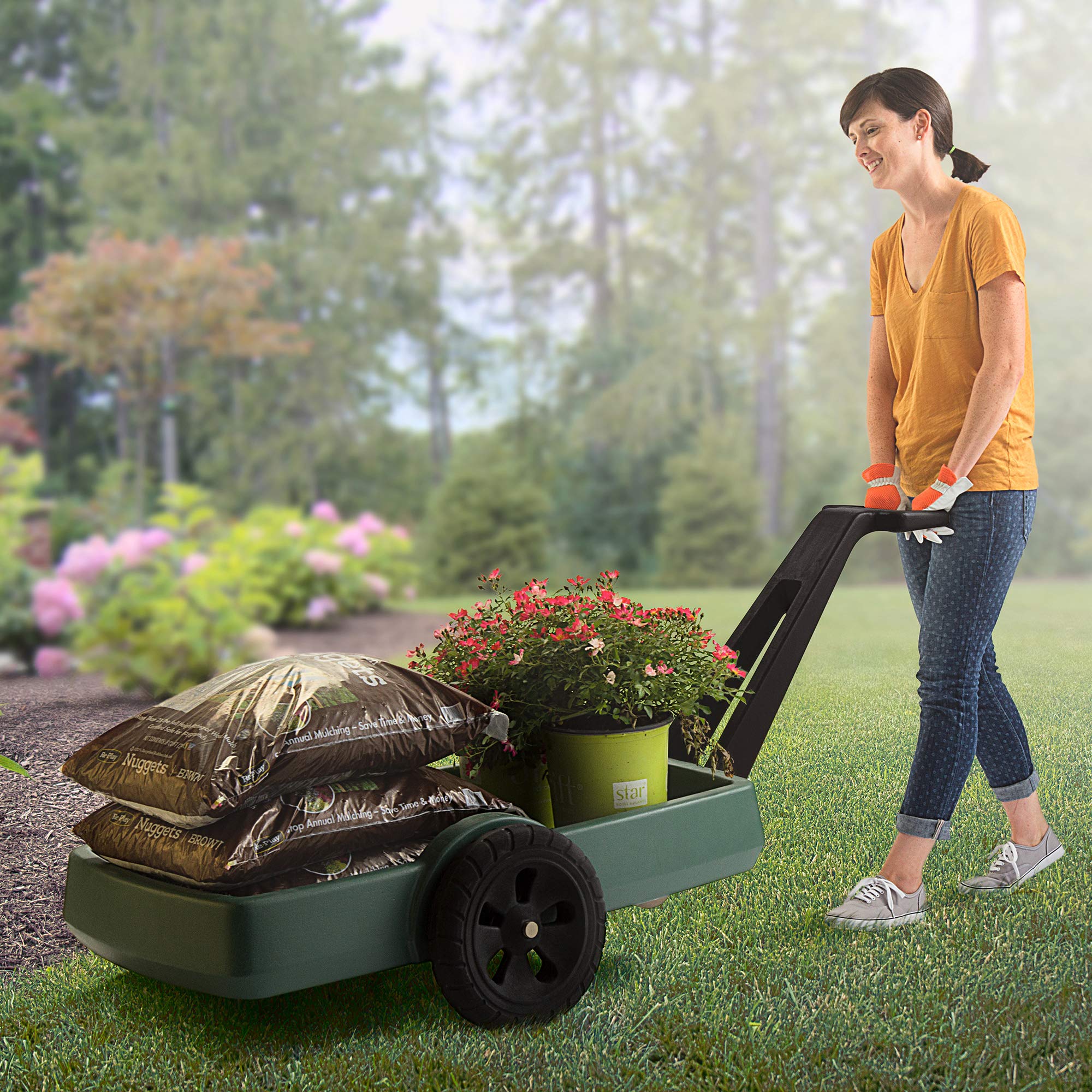 Simplay3 in backyard hauling branches demonstrating ease of use