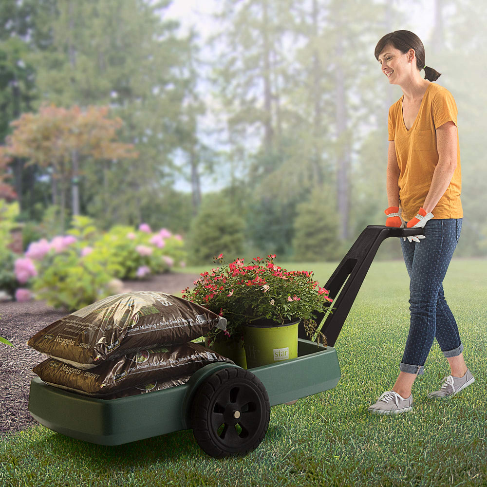 Simplay3 in backyard hauling branches demonstrating ease of use