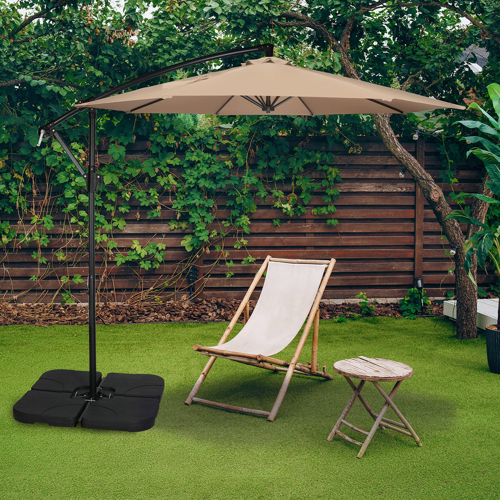 Simple Deluxe umbrella over patio dining set showing comfortable shaded outdoor living