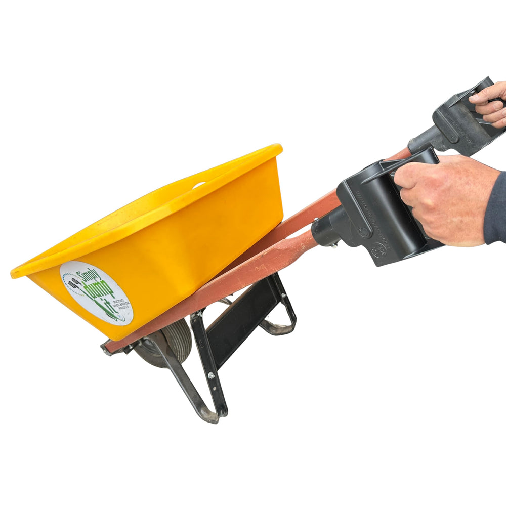 Simply Dump It handles next to a hand showing scale and ergonomic grip advantage