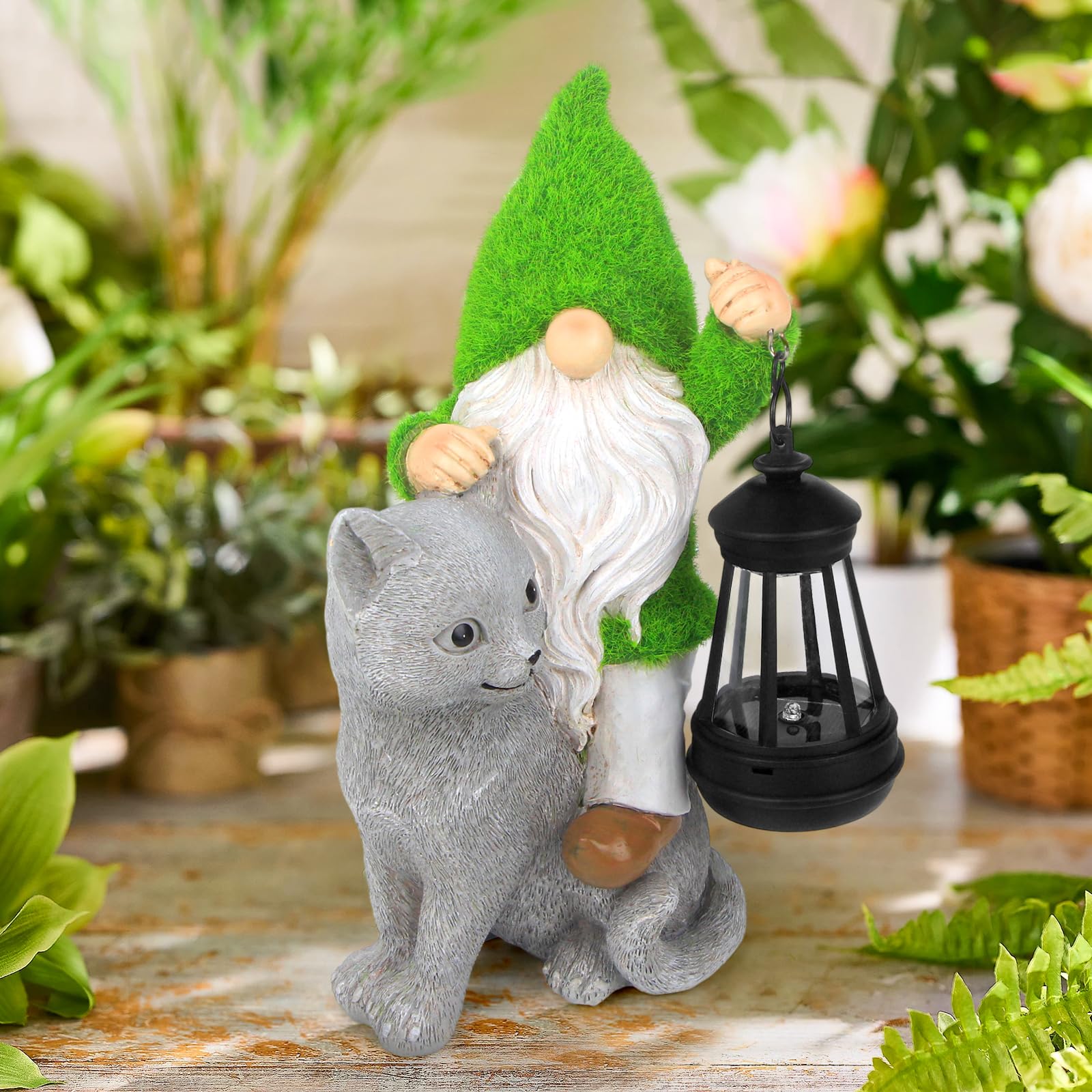 Sinhra gnome lantern closeup lit at dusk providing warm ambient pathway lighting