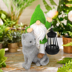 Sinhra gnome lantern closeup lit at dusk providing warm ambient pathway lighting