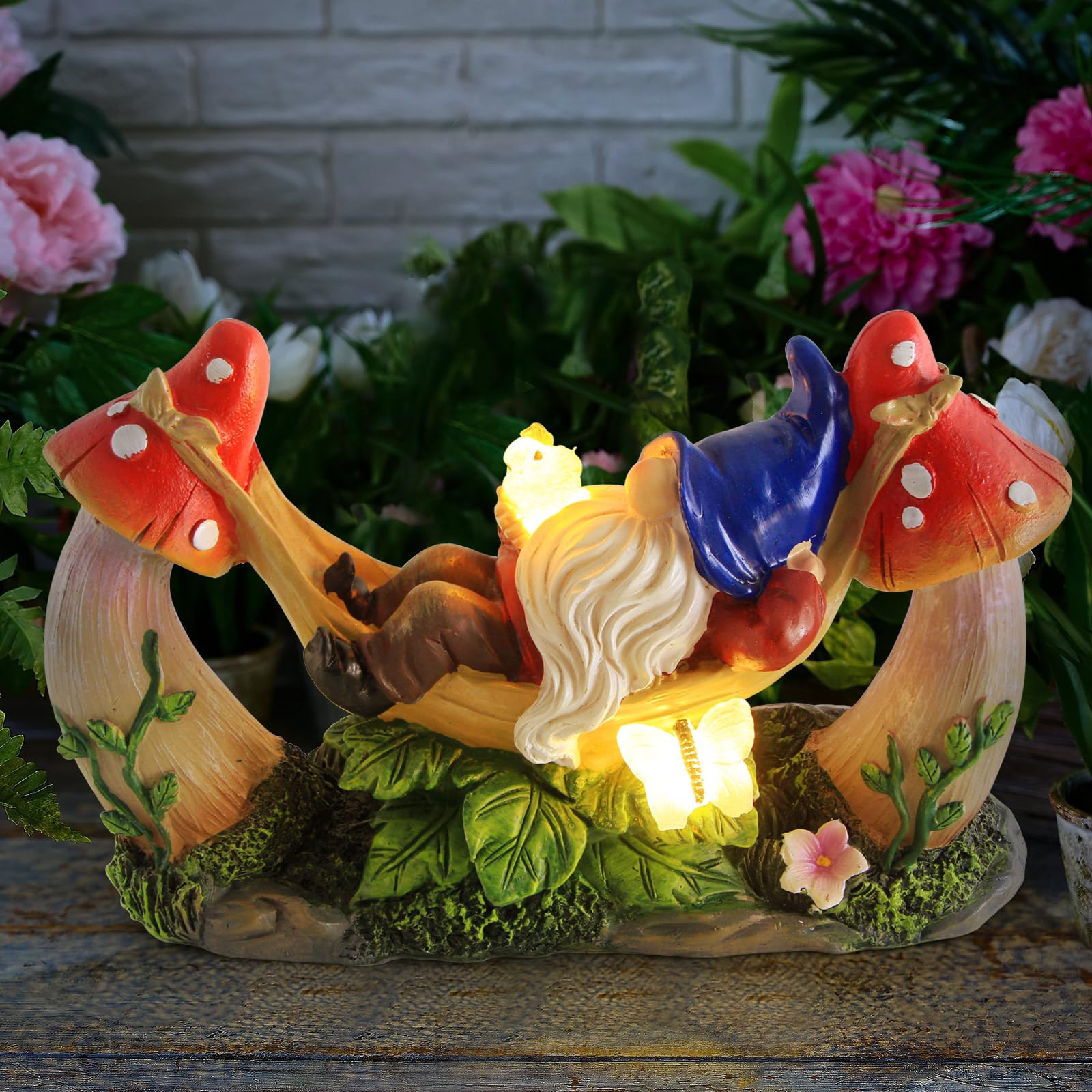 Sinhra gnome illuminated at dusk showing warm LED glow enhancing pathways