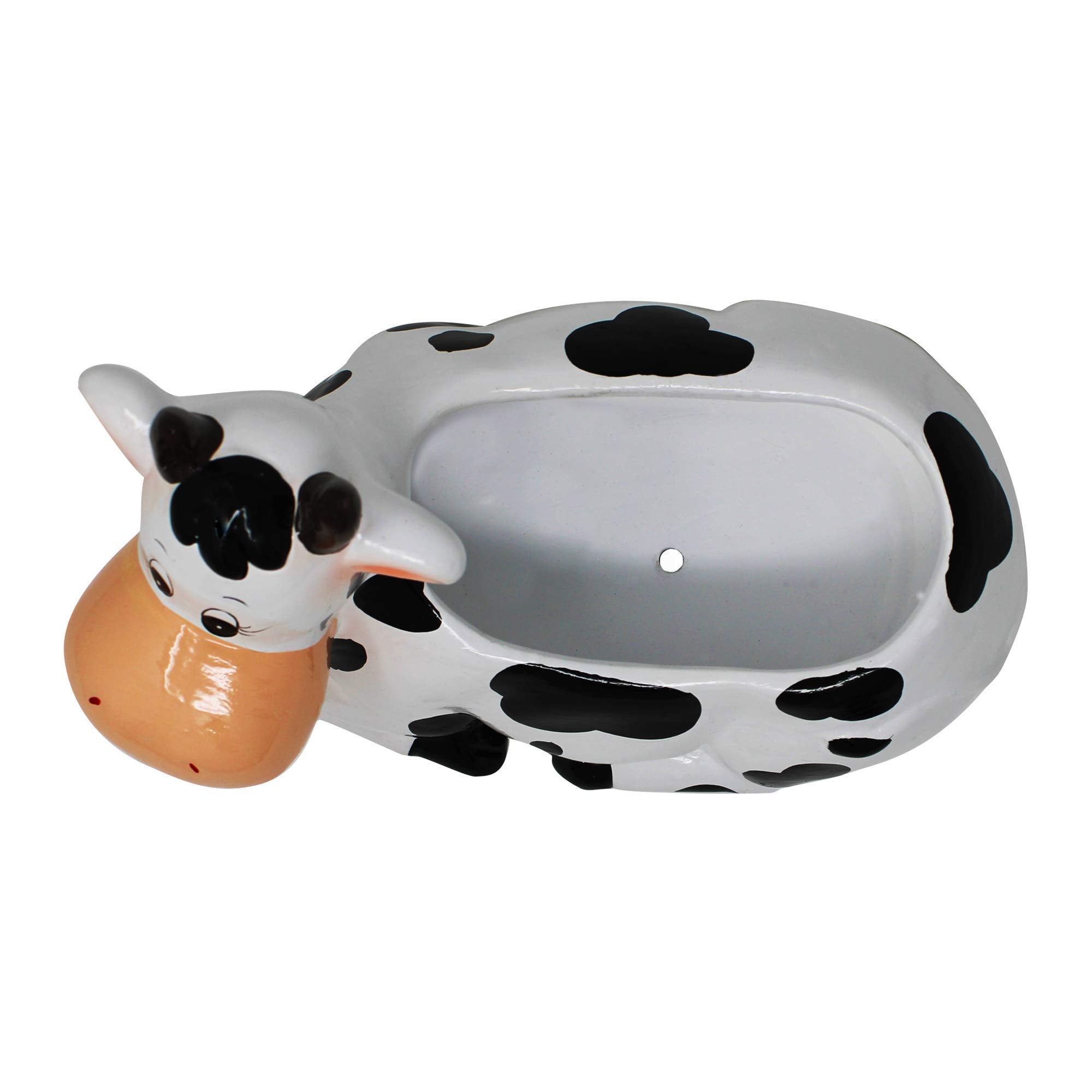 Sixdrop cow planter drain hole detail protecting plants from overwatering
