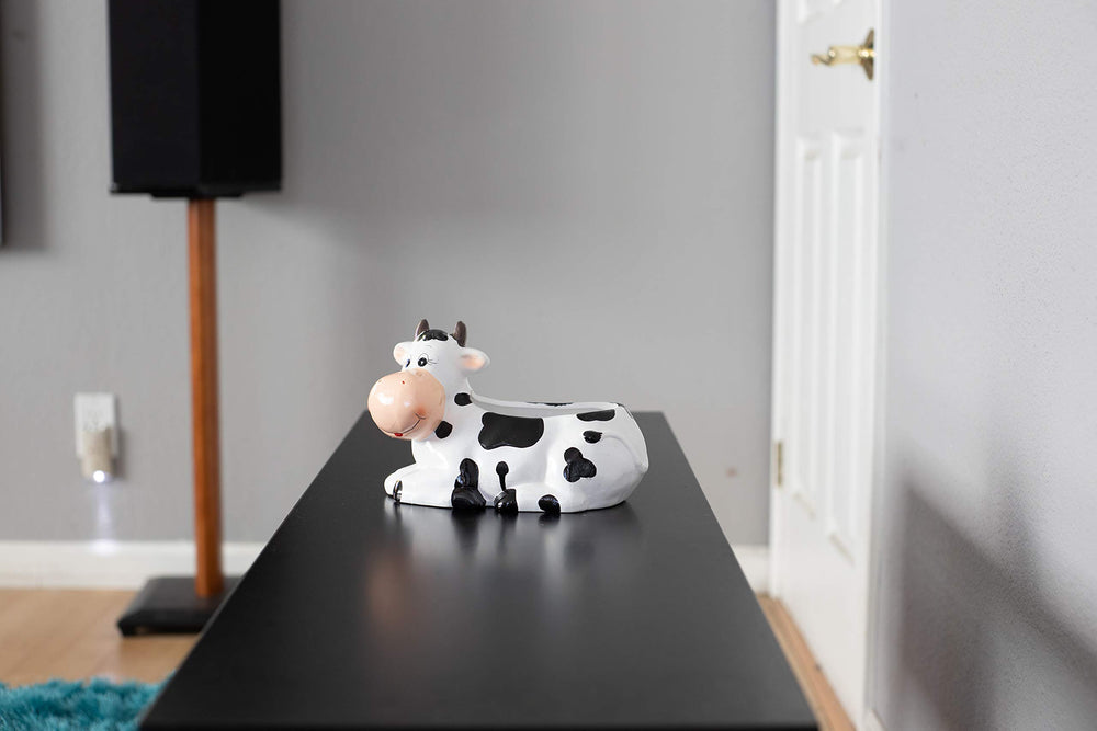 Sixdrop cow planter on kitchen windowsill adding farmhouse charm and herbs