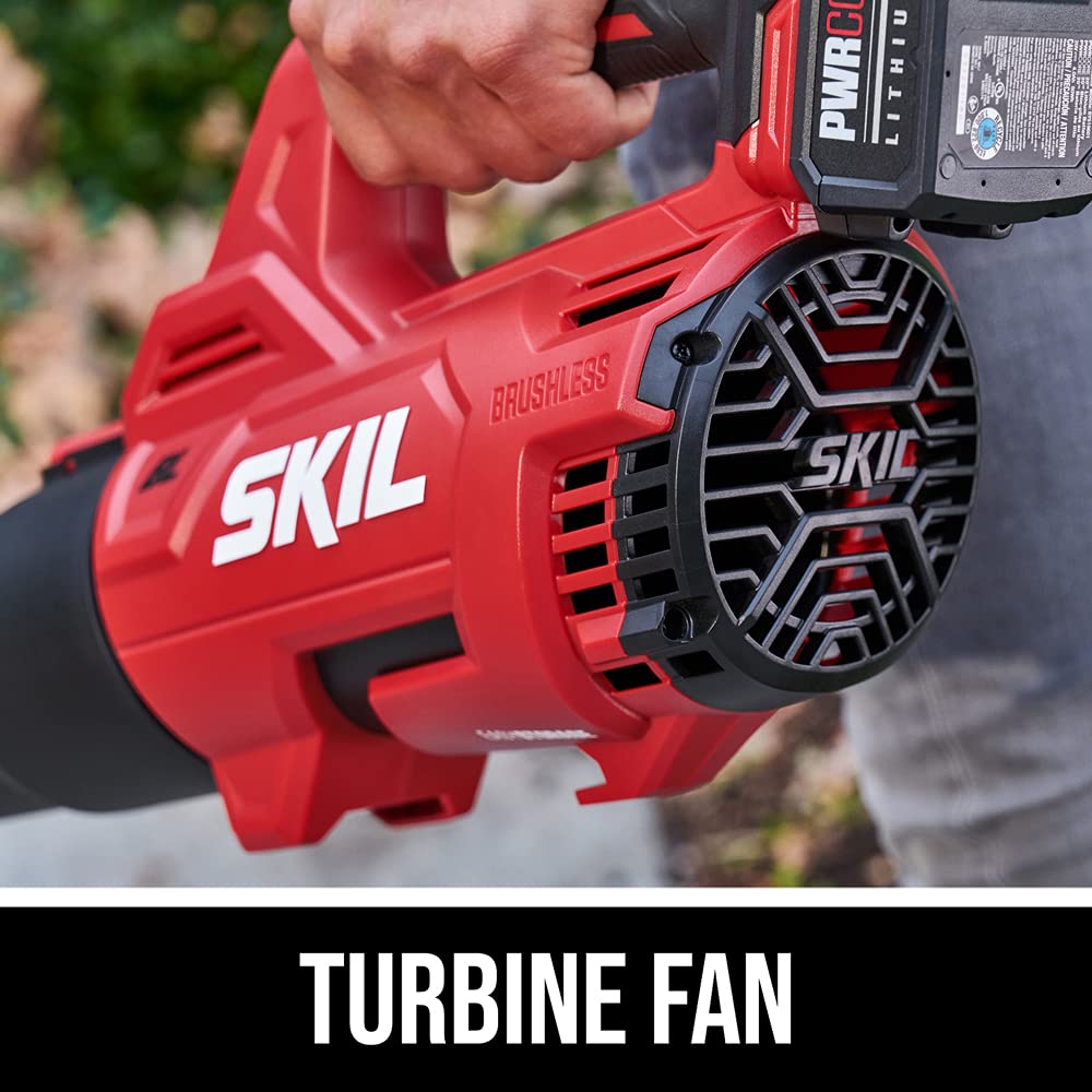 SKIL blower moving leaves on driveway for quick debris cleanup