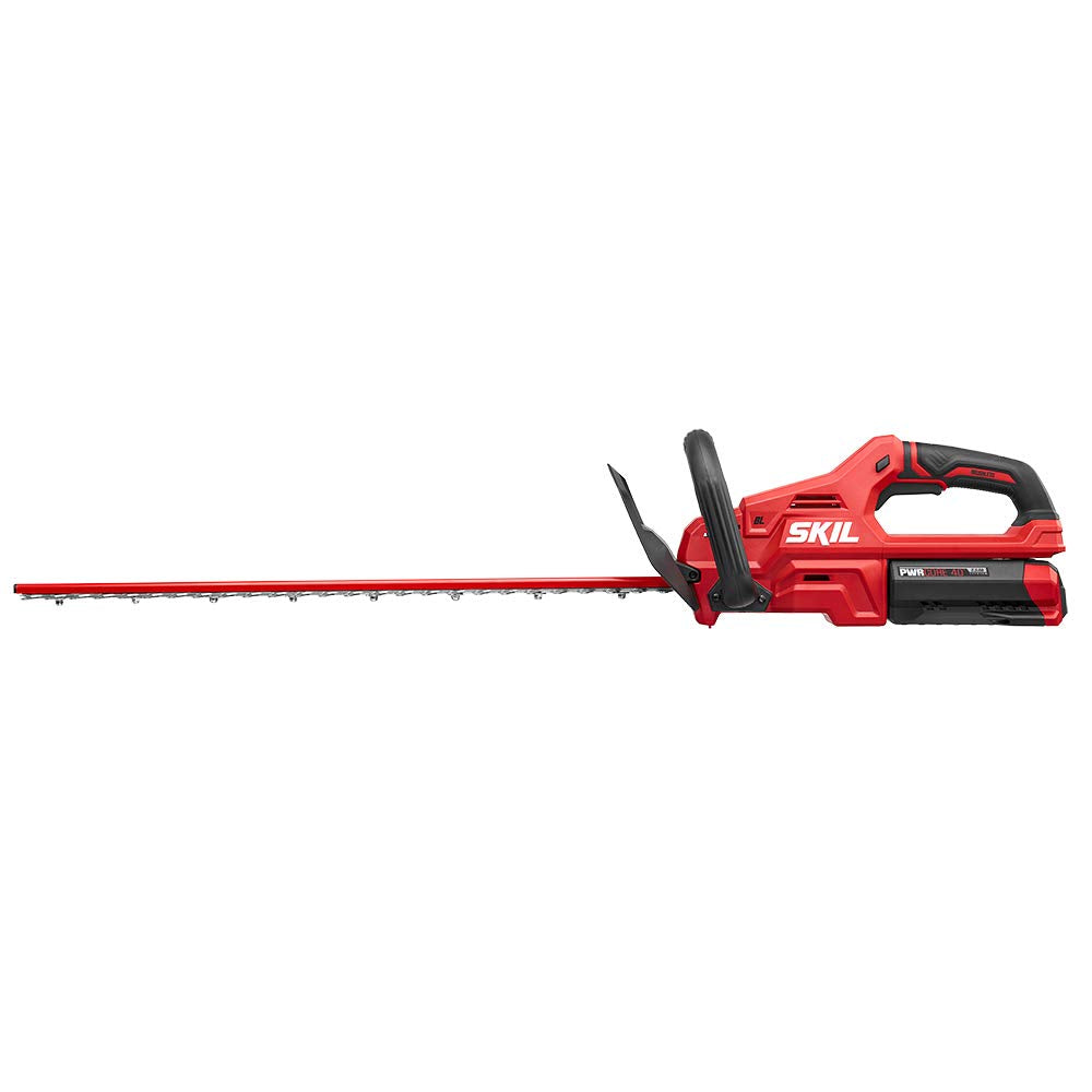 SKIL kit packaging open showing trimmer, 2.5Ah battery and fast charger included