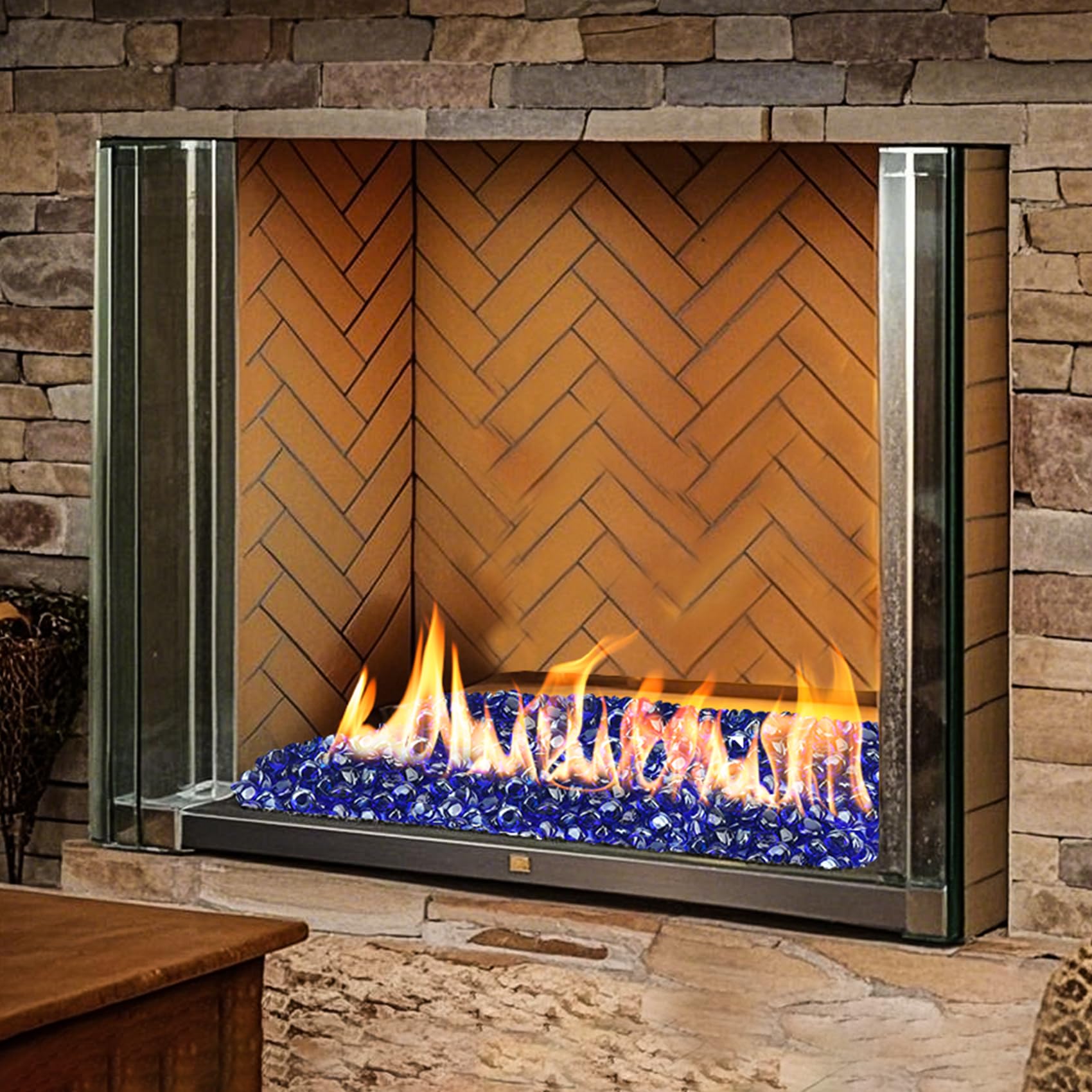 Skyflame outdoor evening scene with fire glass creating ambiance benefit
