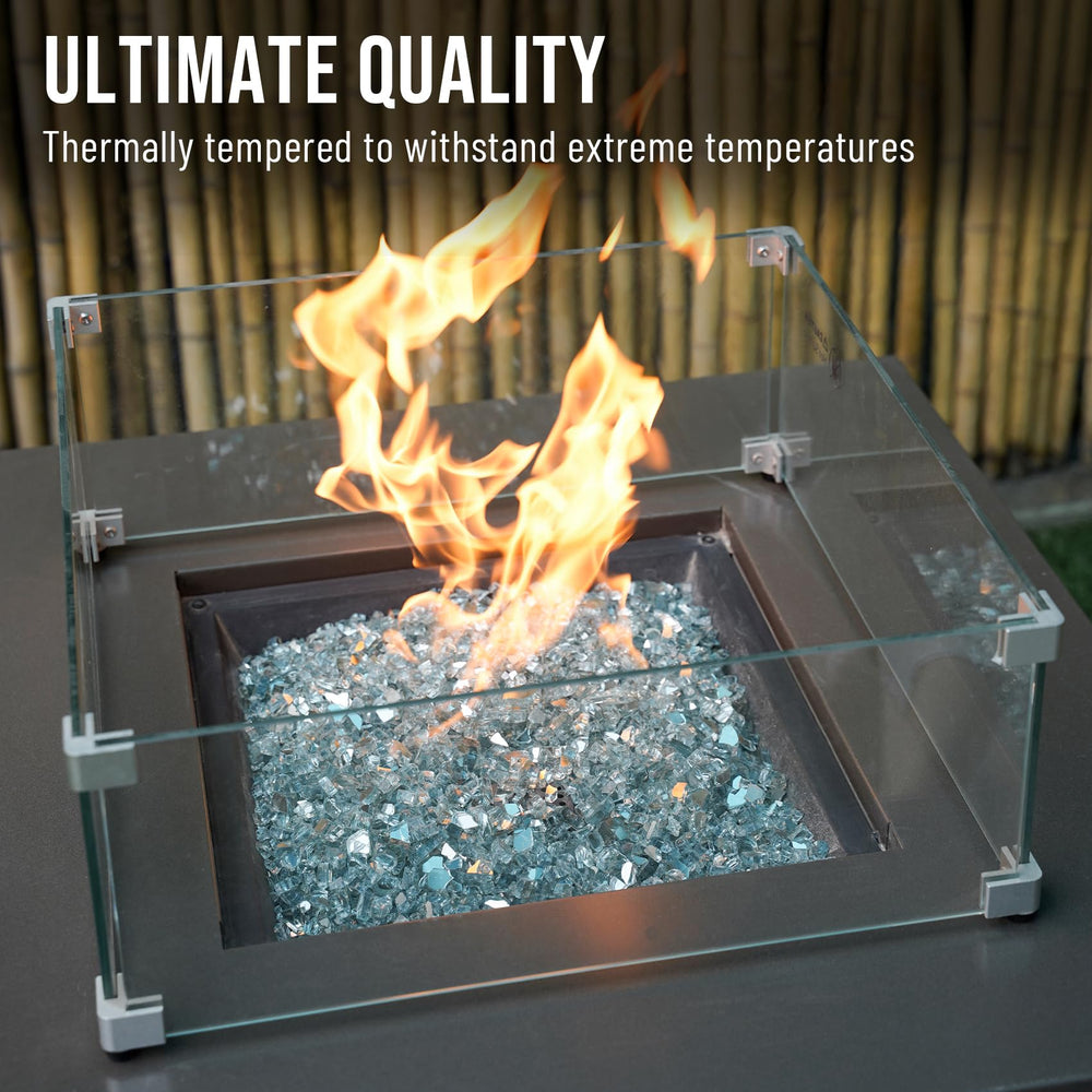 Skyflame glass close to fireplace flame showing reflective finish and cleaner burn appearance