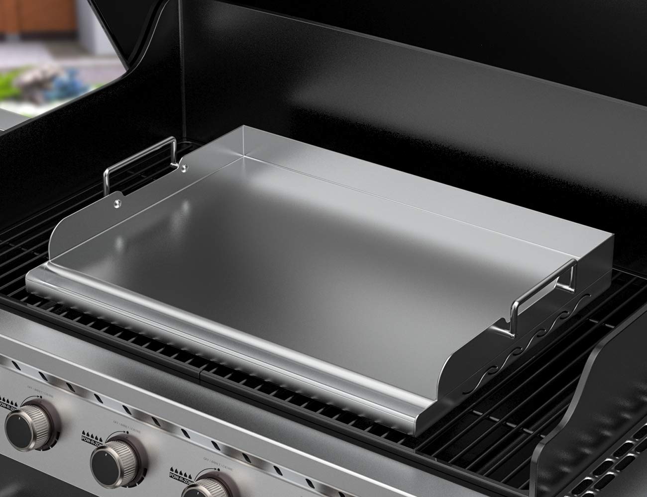 Skyflame griddle in use on charcoal grill cooking eggs to demonstrate versatility and results