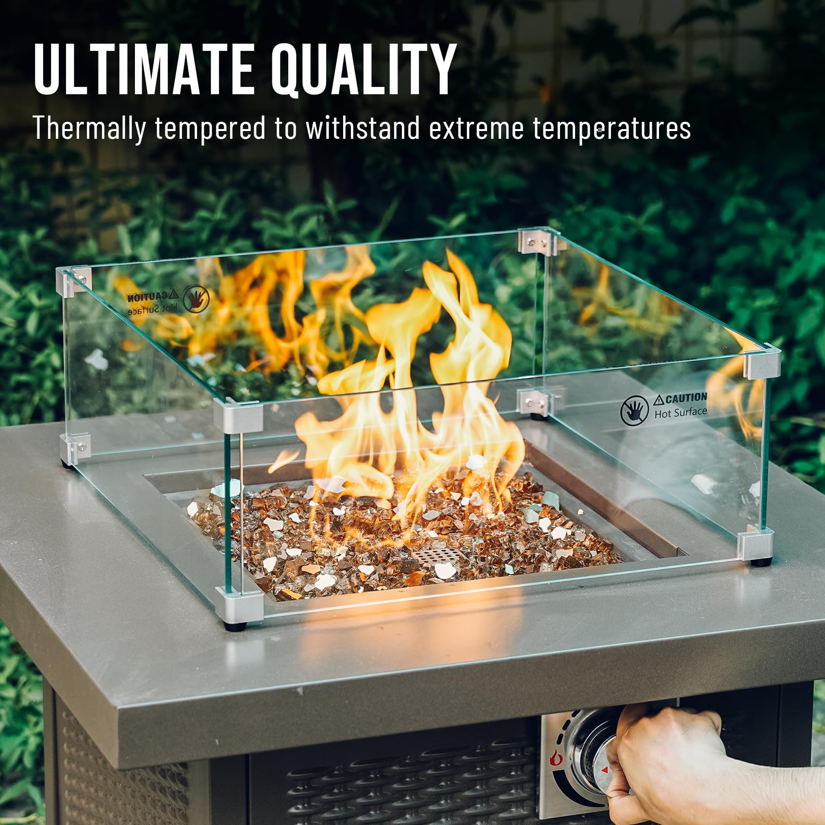 Skyflame lit fire pit with copper glass showing dazzling flame sparkle