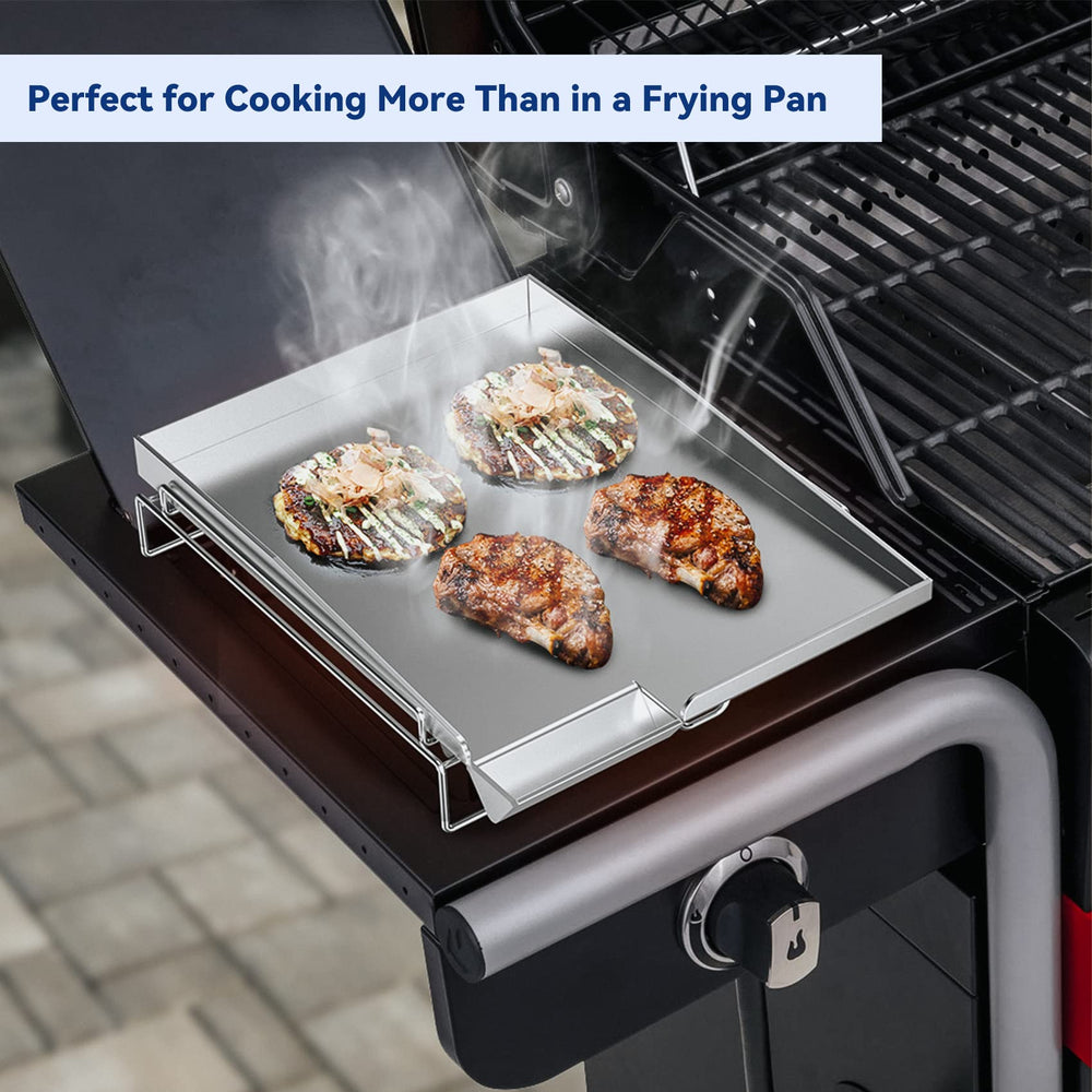 Skyflame griddle beside utensils to show scale and versatile cooking area