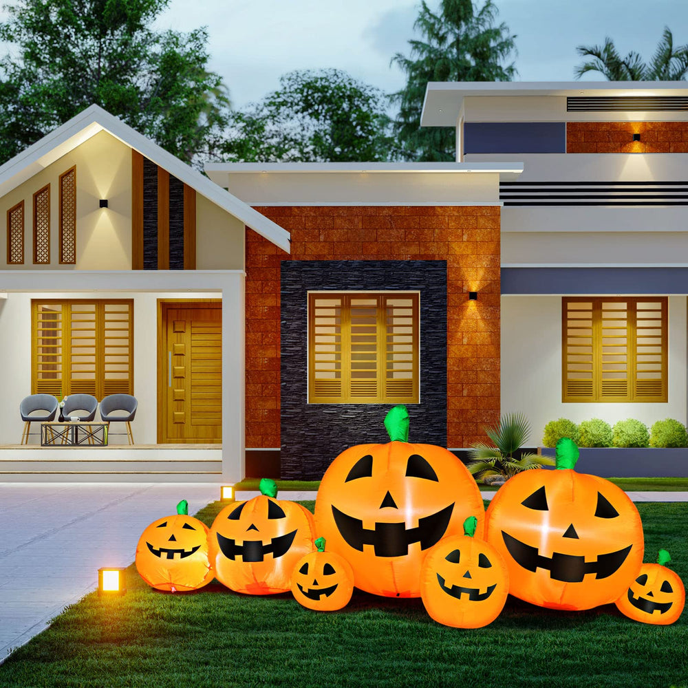 Skylety nighttime yard scene with glowing pumpkins creating festive visibility