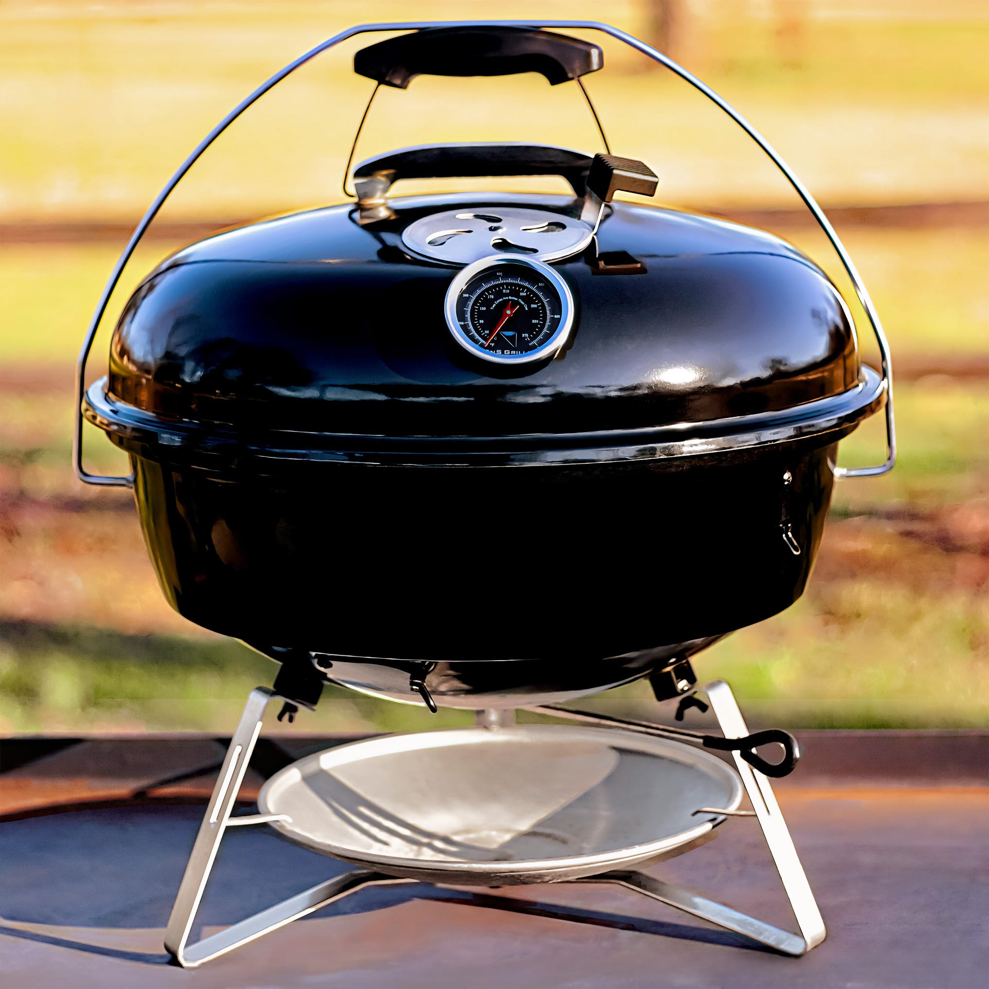 Slow 'N Sear EasySpin grate rotated for direct coal access and convenience