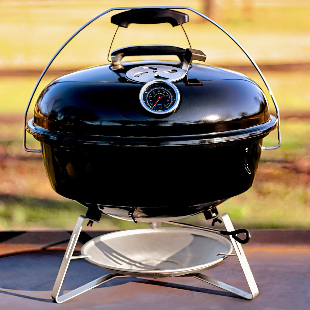 Slow 'N Sear EasySpin grate rotated for direct coal access and convenience