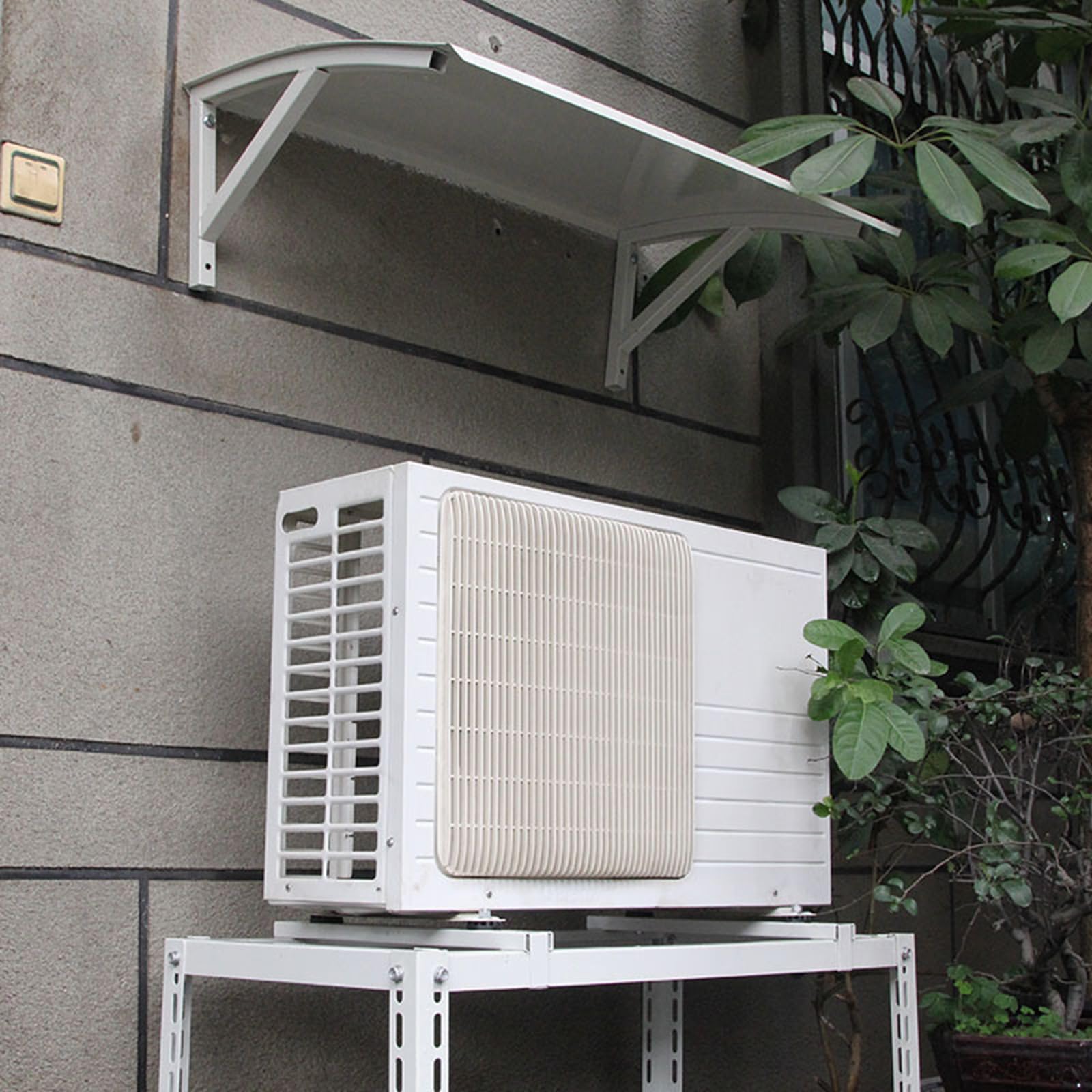 SLVUAFRN installed on porch beside landscaping, offering discreet outdoor equipment protection