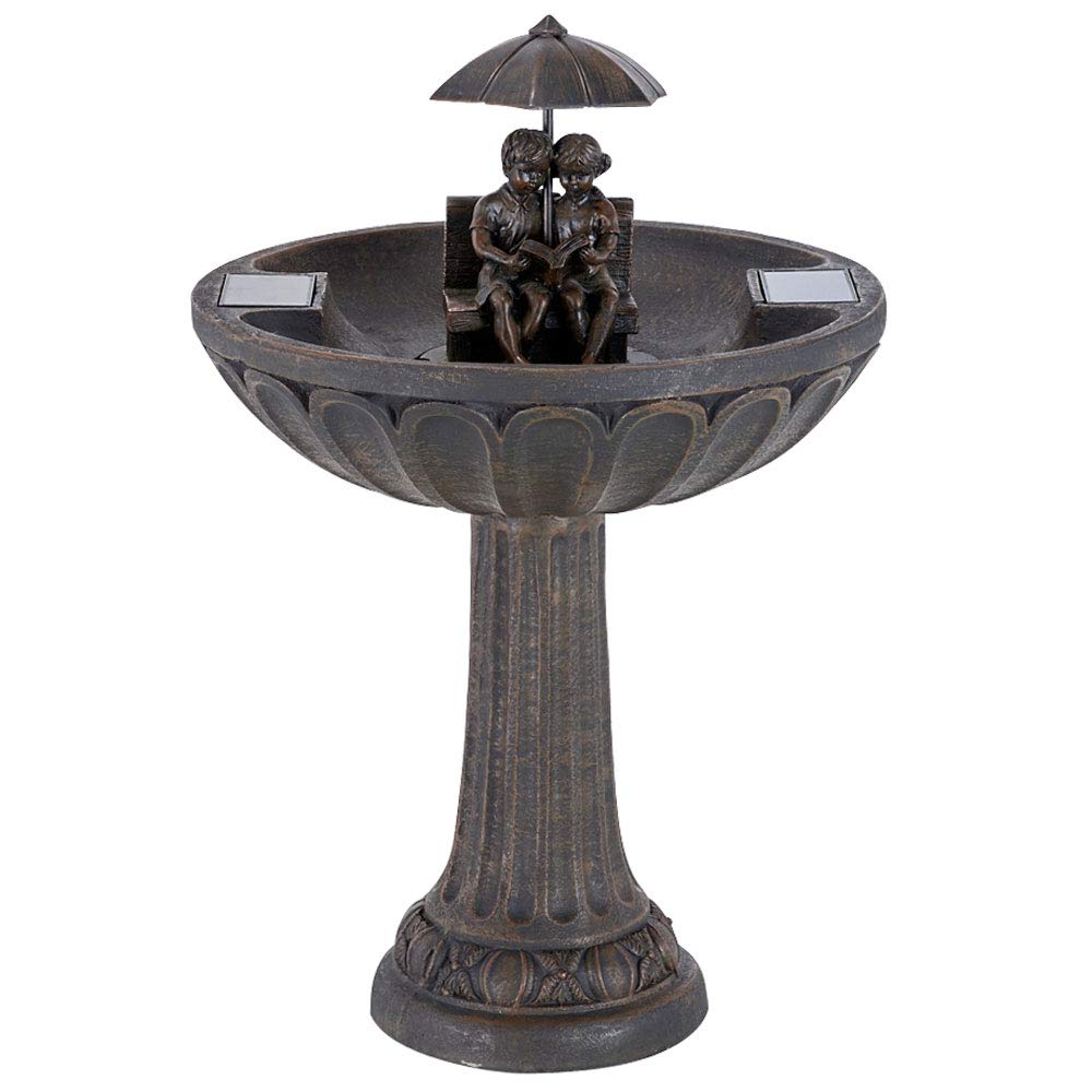 Smart Solar front view aged bronze fountain showing boy and girl for visual appeal