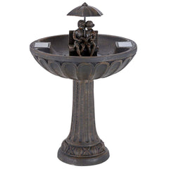 Smart Solar front view aged bronze fountain showing boy and girl for visual appeal