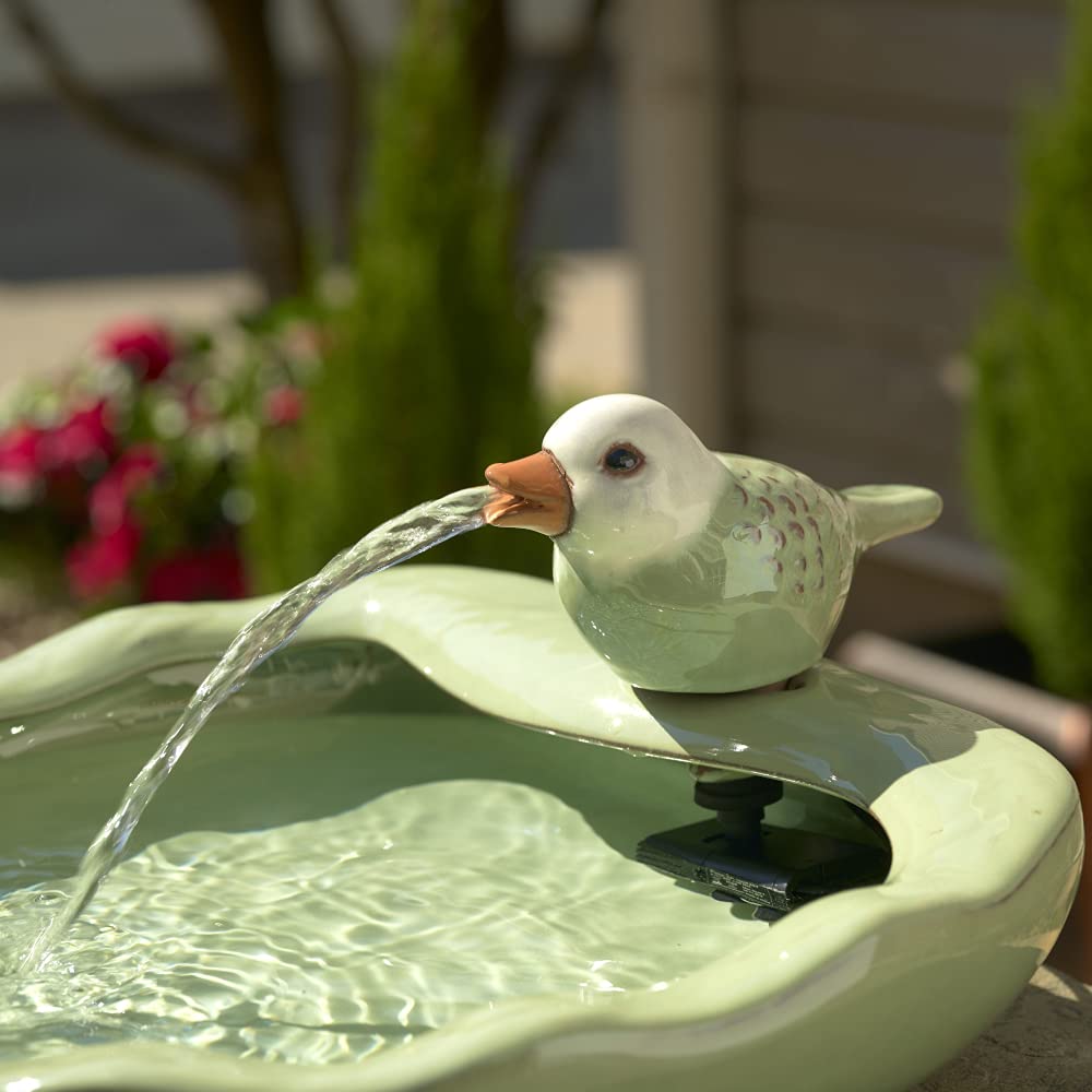 Smart Solar fountain next to a hand for scale illustrating compact size and easy placement benefit
