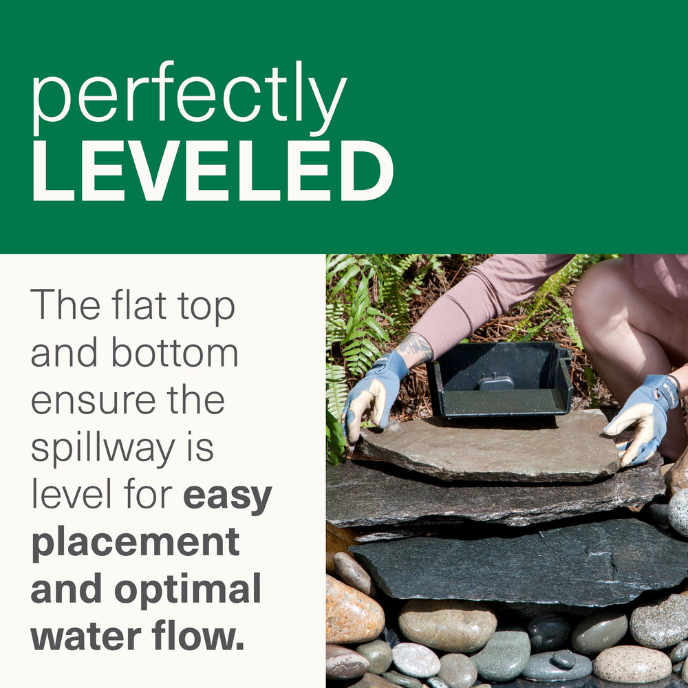 Smartpond spillway in landscaped pond setting showing natural-looking waterfall benefit