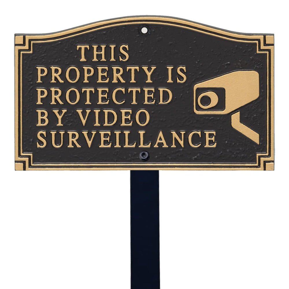 SmartSign front view of black and gold plaque showing clear surveillance message