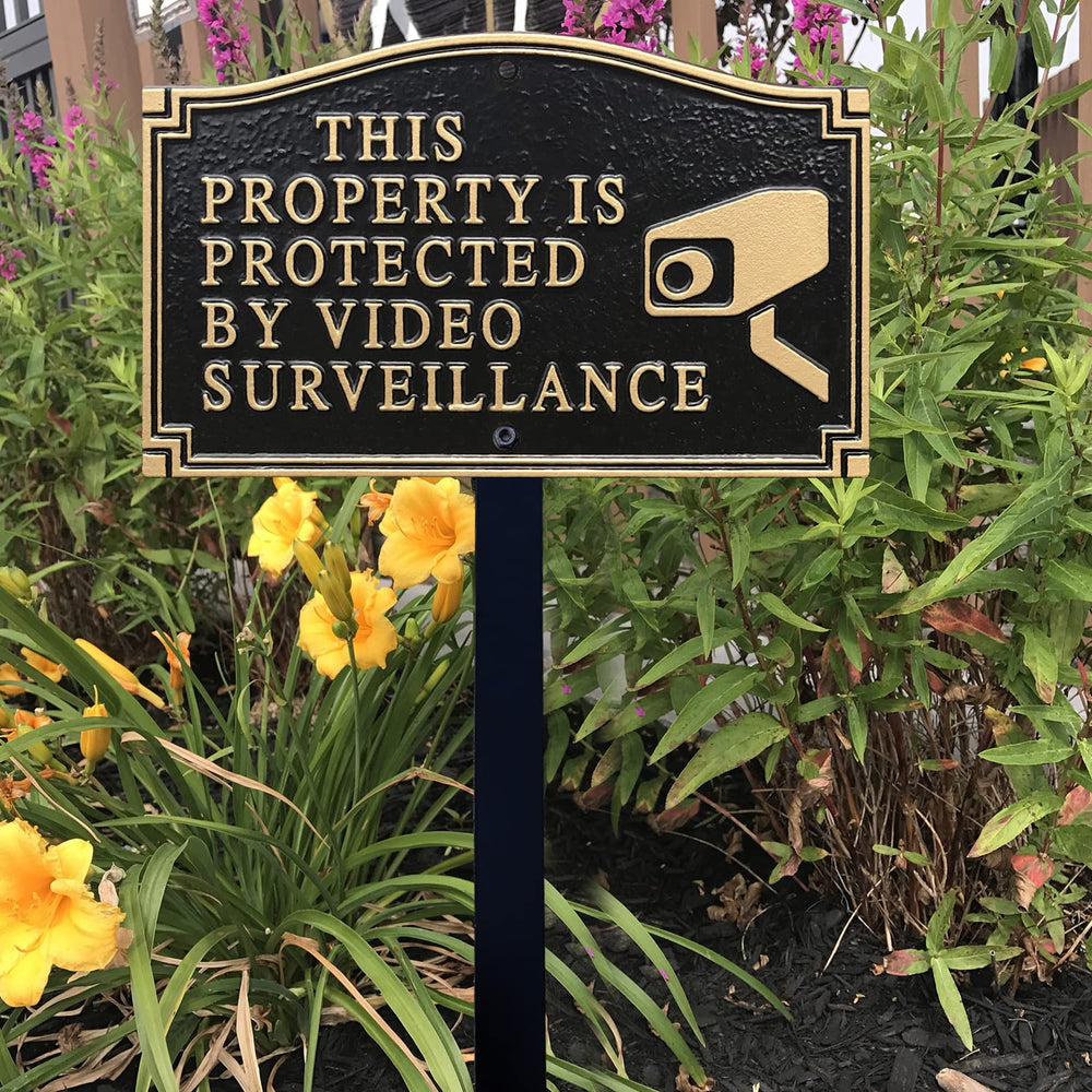 SmartSign mounted on fence demonstrating wall attachment versatility