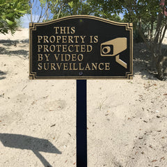 SmartSign plaque on 18-inch stake placed in lawn for easy installation