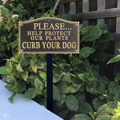 SmartSign plaque mounted on a fence using predrilled holes and included hardware for easy installation