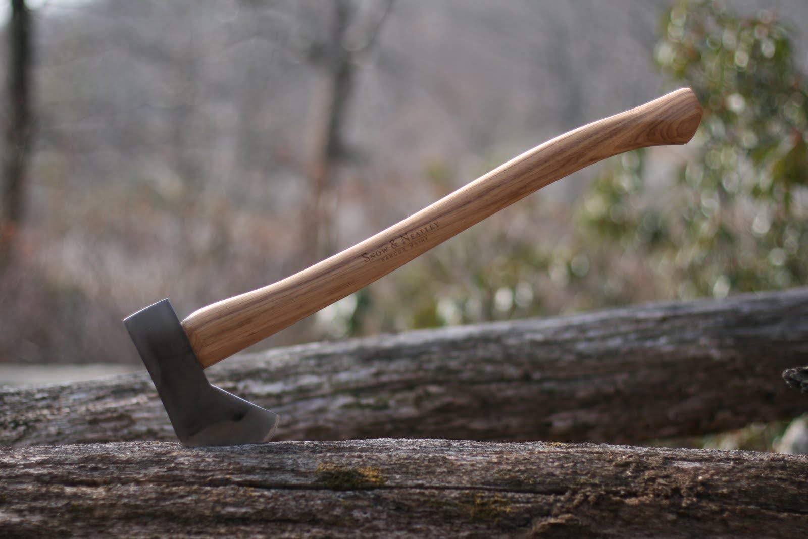 Snow & Nealley axe placed at campsite illustrating portability and practical outdoor use