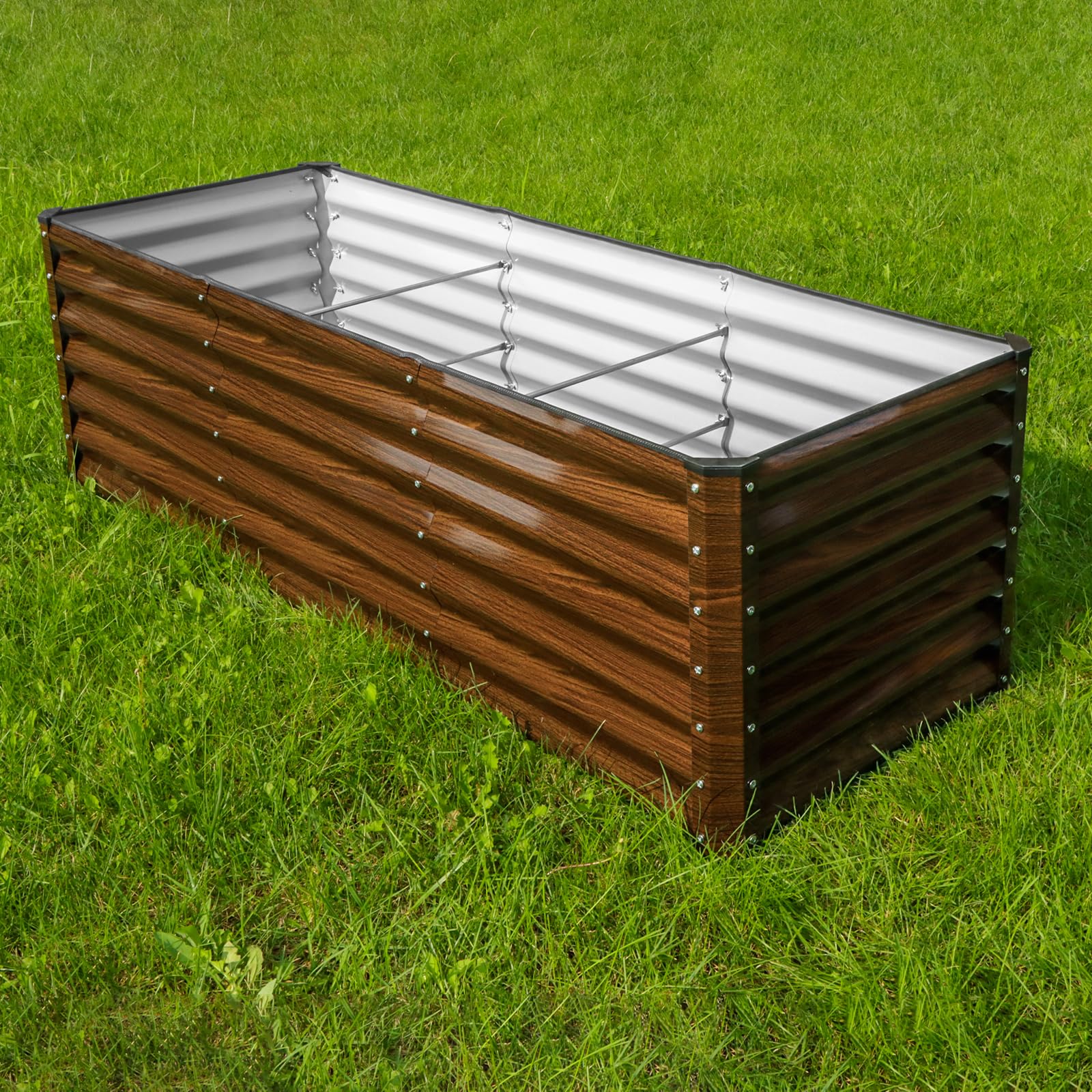 SnugNiture raised bed planted with vegetable rows demonstrating organized harvesting