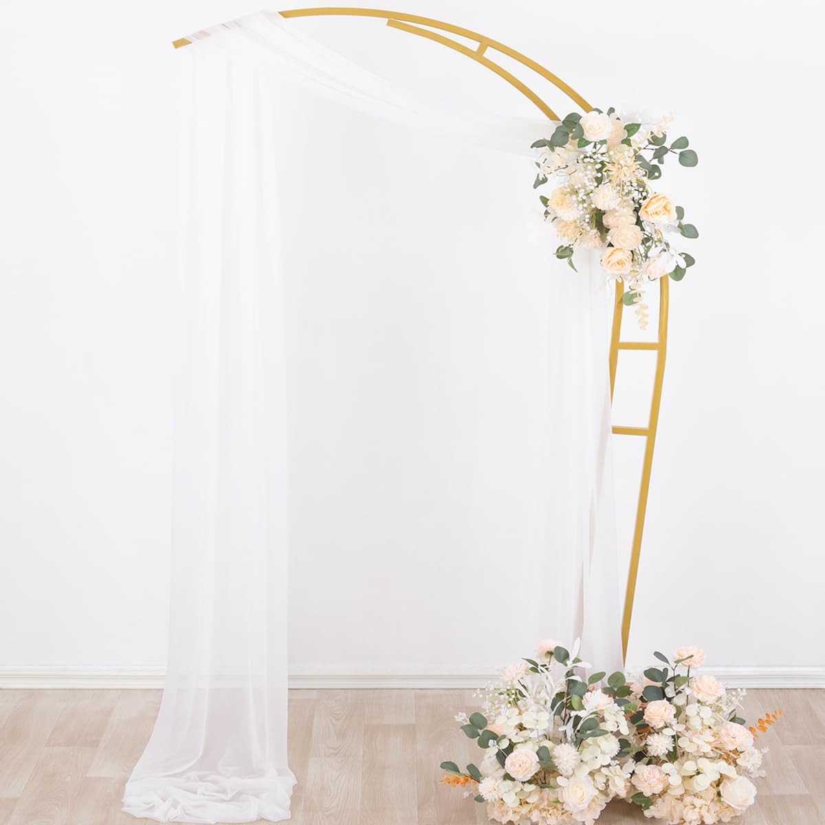 Socomi arch drapes installed at wedding creating romantic photo backdrop