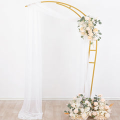 Socomi arch drapes installed at wedding creating romantic photo backdrop
