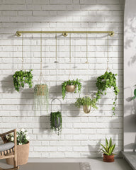 SOFITORG installed above a window with hanging plants, maximizes indoor space