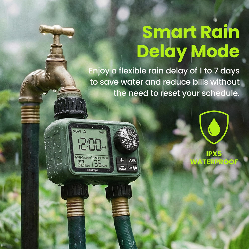 Soildrops timer attached to hose powering a garden sprinkler for automated watering