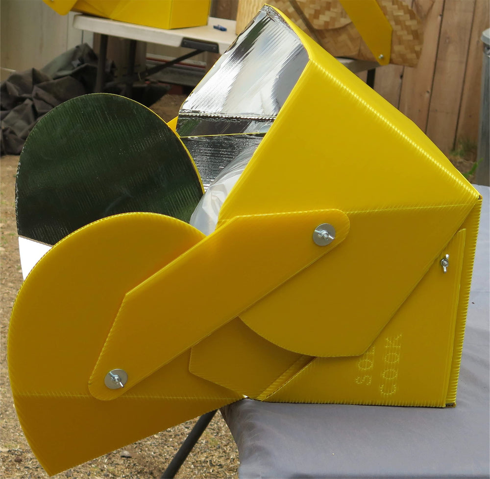 SOL COOK dehydrating fruit trays demonstrating faster preservation without electricity