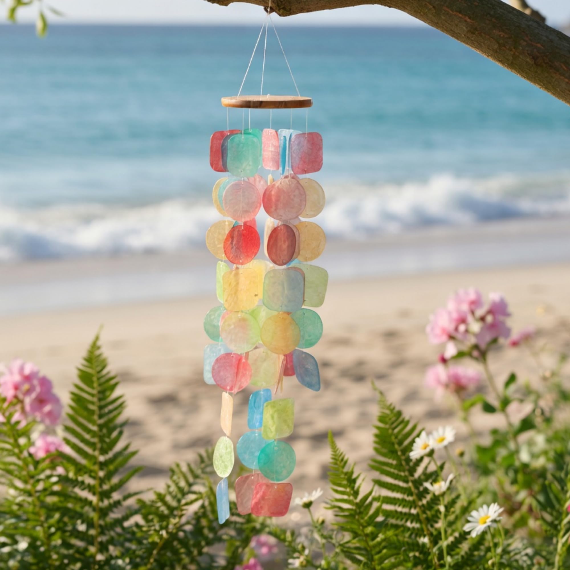Solange & Frances backlit chimes at sunset showcasing shimmering color reflection