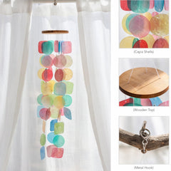 Solange & Frances wind chime hanging on a porch adding calm ambiance