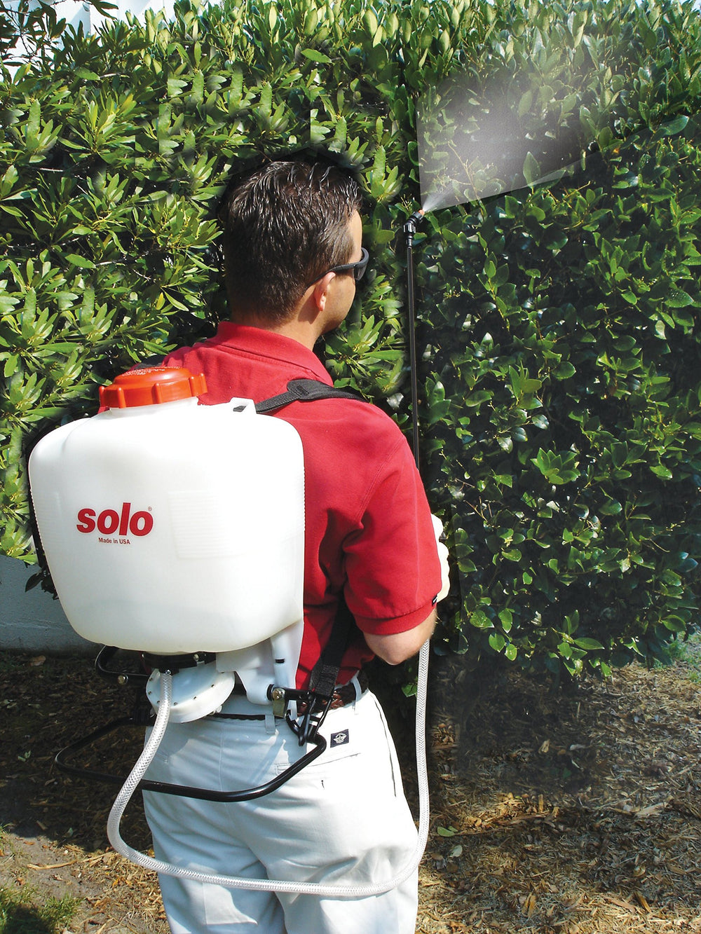 SOLO sprayer in use applying disinfectant for efficient large-area coverage