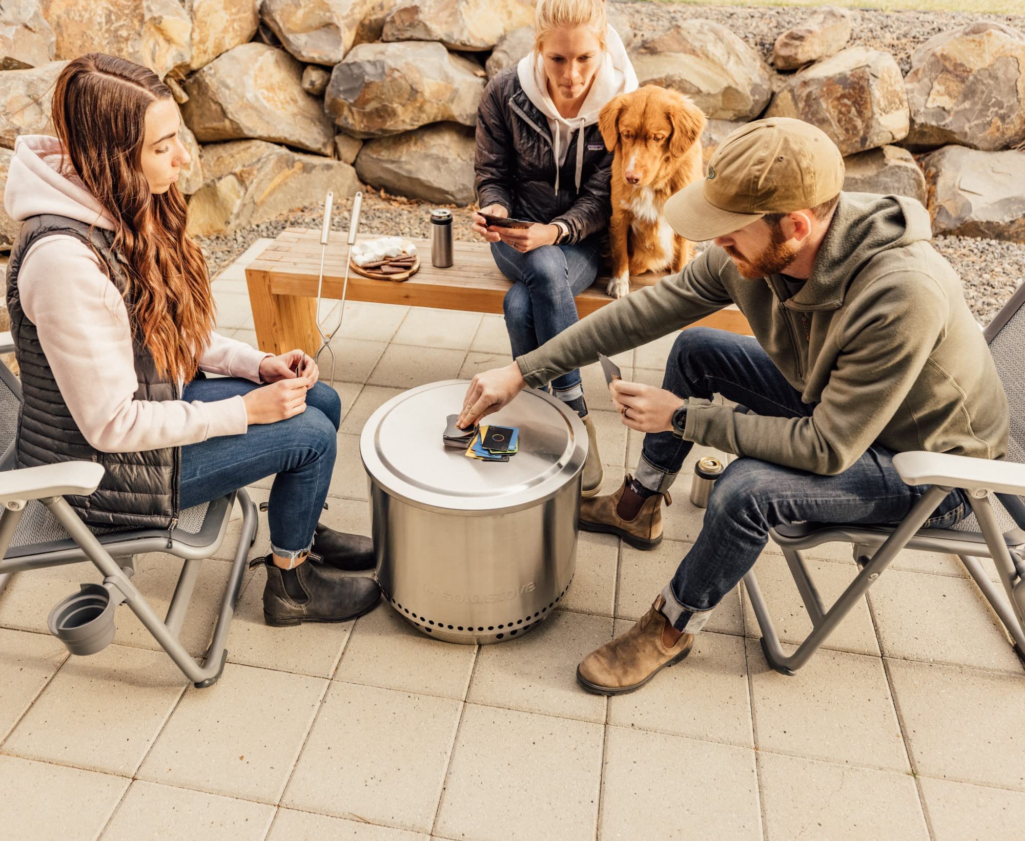 Solo Stove Bonfire lid on a campsite table illustrating portability and multiuse convenience