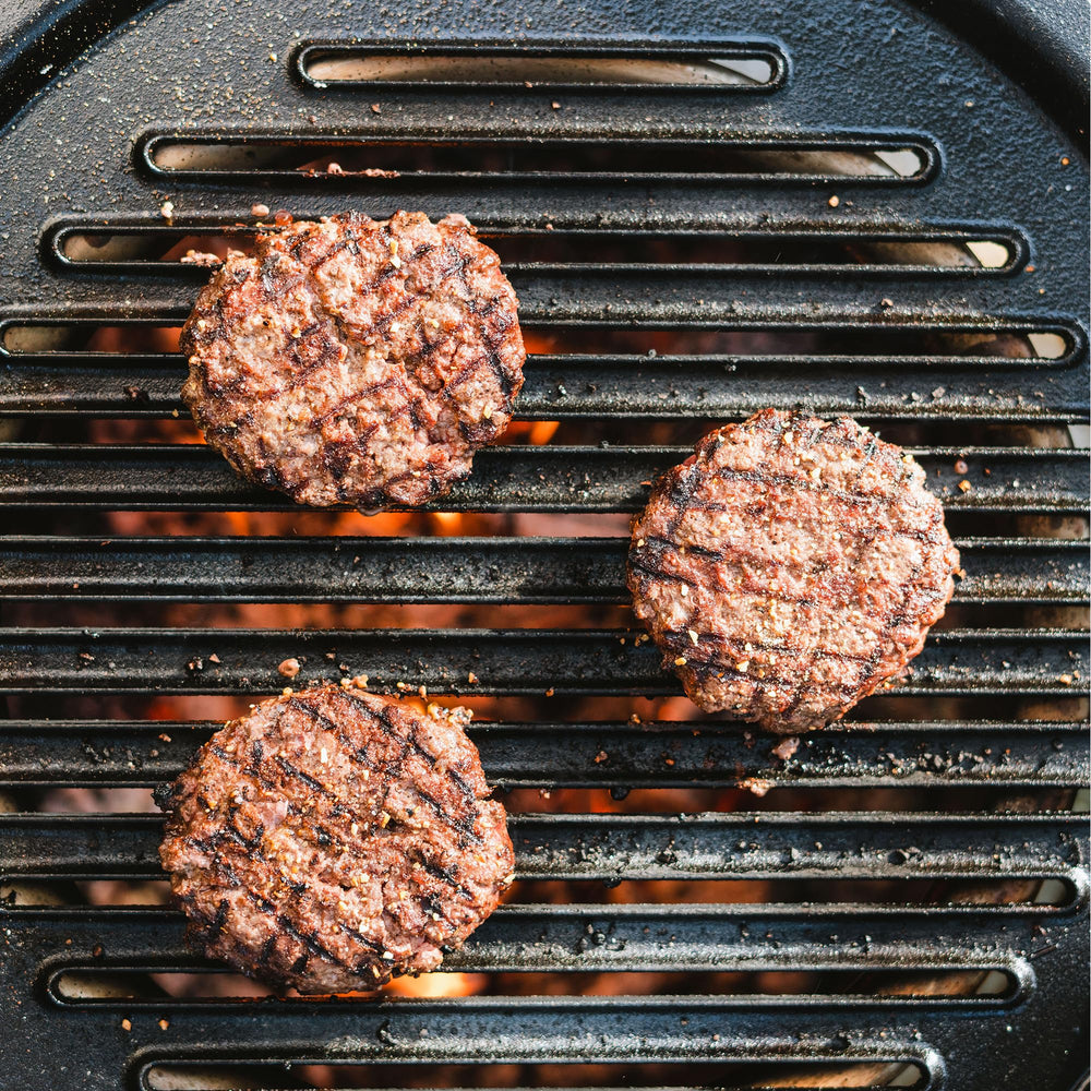 Solo Stove grill after seasoning showing oiled sheen and benefit of improved non-stick surface
