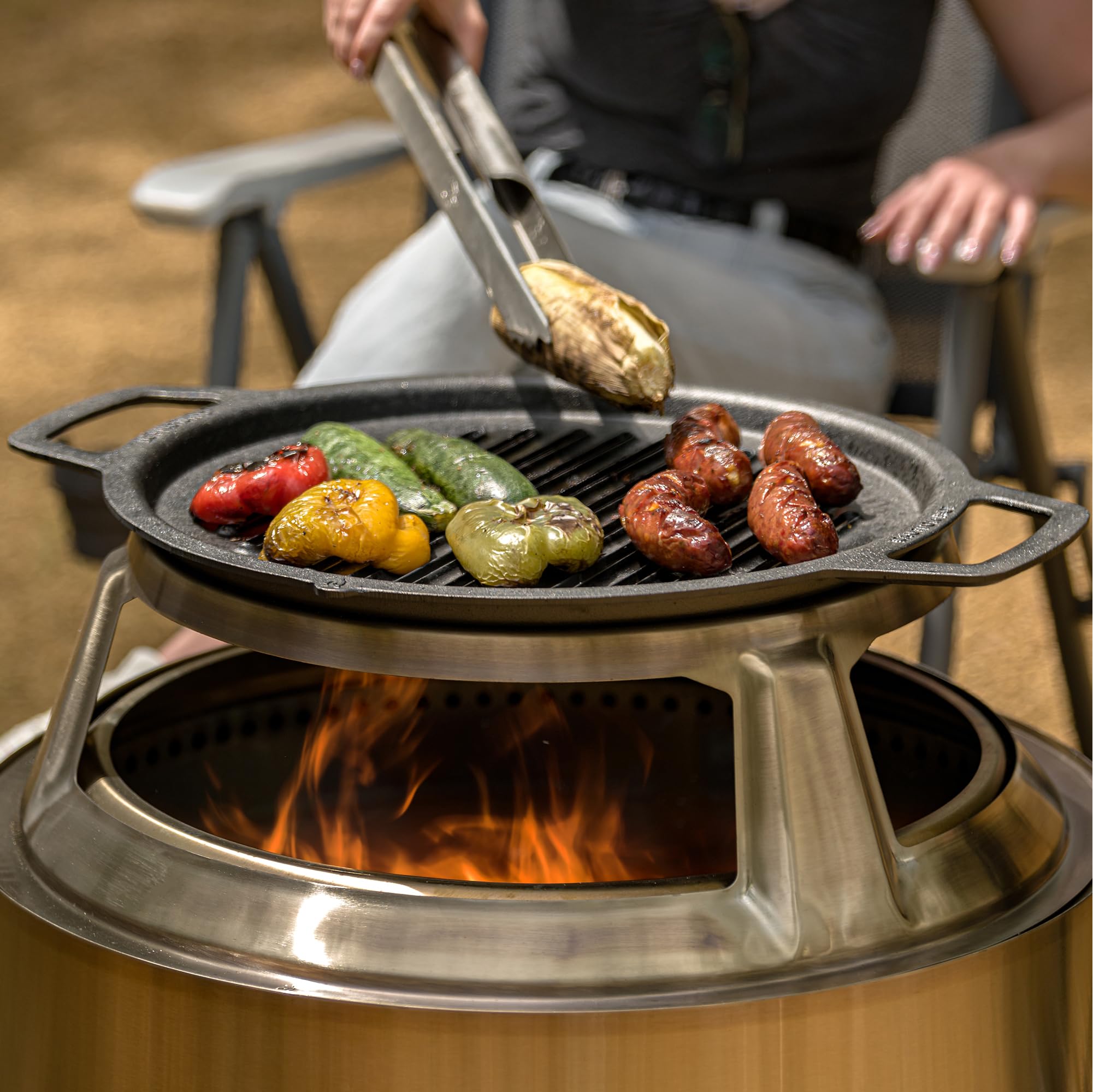 Solo Stove grill packed in camping bag showing portability and benefit of outdoor convenience