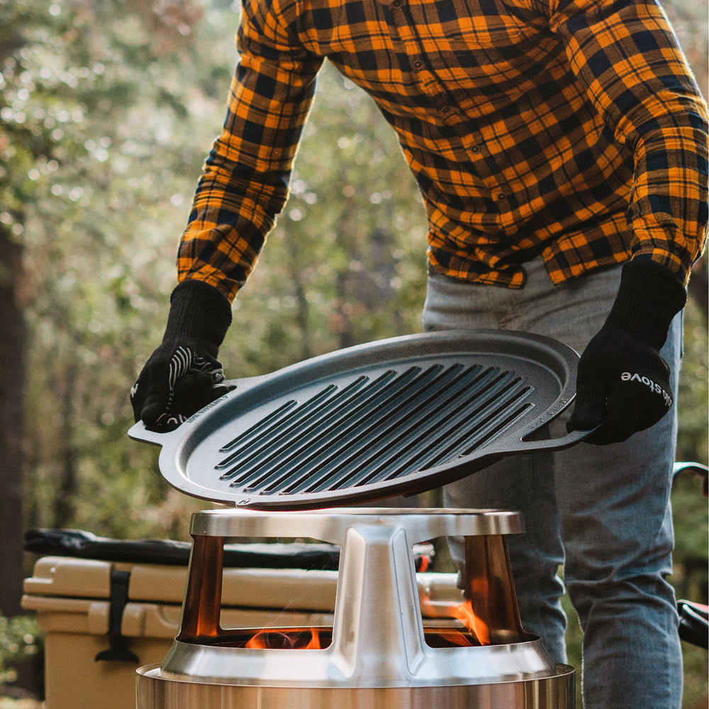 Solo Stove grill beside tape measure showing 17.75 inch diameter and benefit of clear size scale