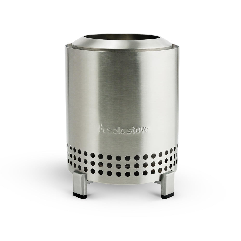 Solo Stove Mesa front view on table showing compact smokeless flame and ambiance