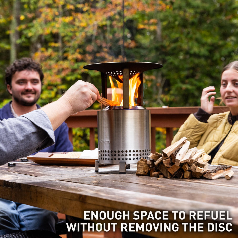 Solo Stove deflector installed on Mesa XL fire pit directing warmth outward
