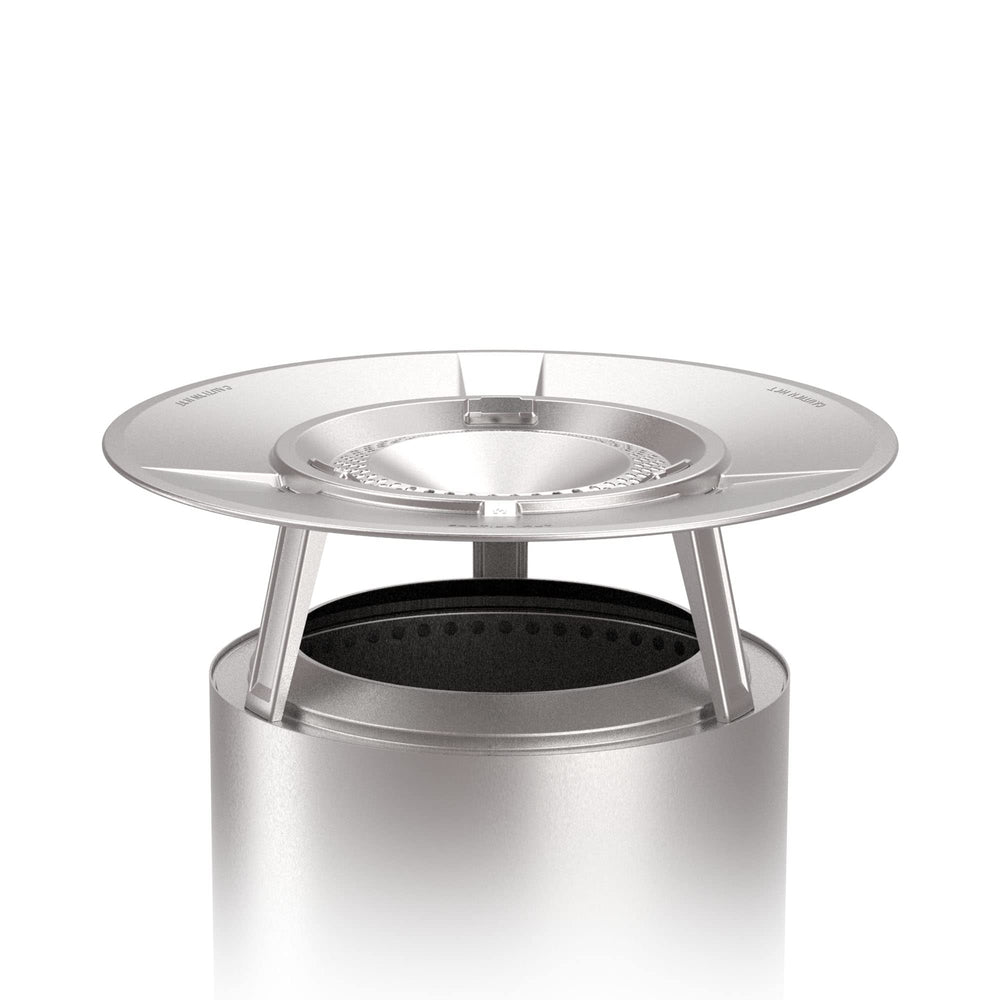Solo Stove heat deflector front view showing angled design and warmth benefit