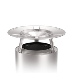 Solo Stove heat deflector front view showing angled design and warmth benefit
